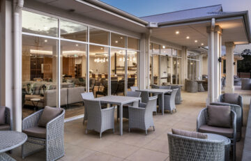 outdoor dining area by twilight at Green Ridge Pavilion